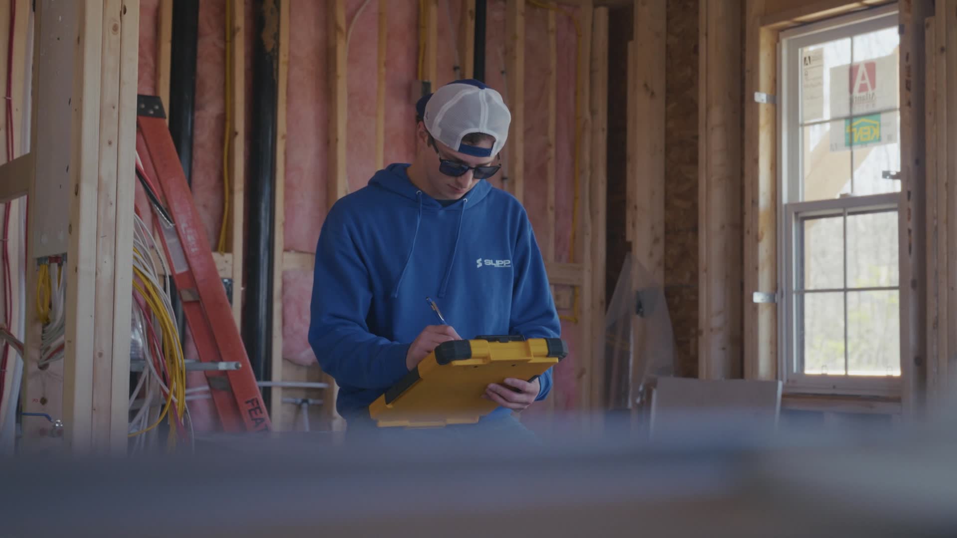 Slipp Construction crew reviewing drawings on site